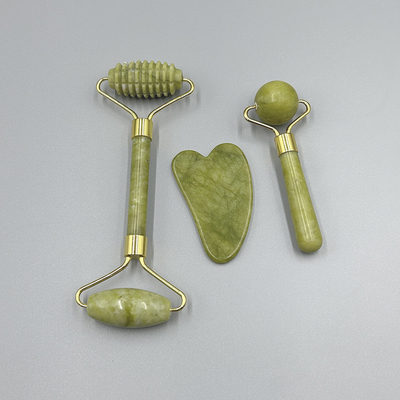 OEM/ODM Rose Quartz Jade Roller Facial Stone Massager Set con olio di siero e Gunsha