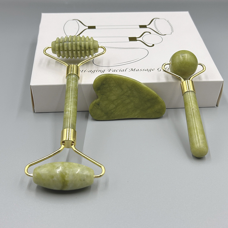 OEM/ODM Rose Quartz Jade Roller Facial Stone Massager Set con olio di siero e Gunsha